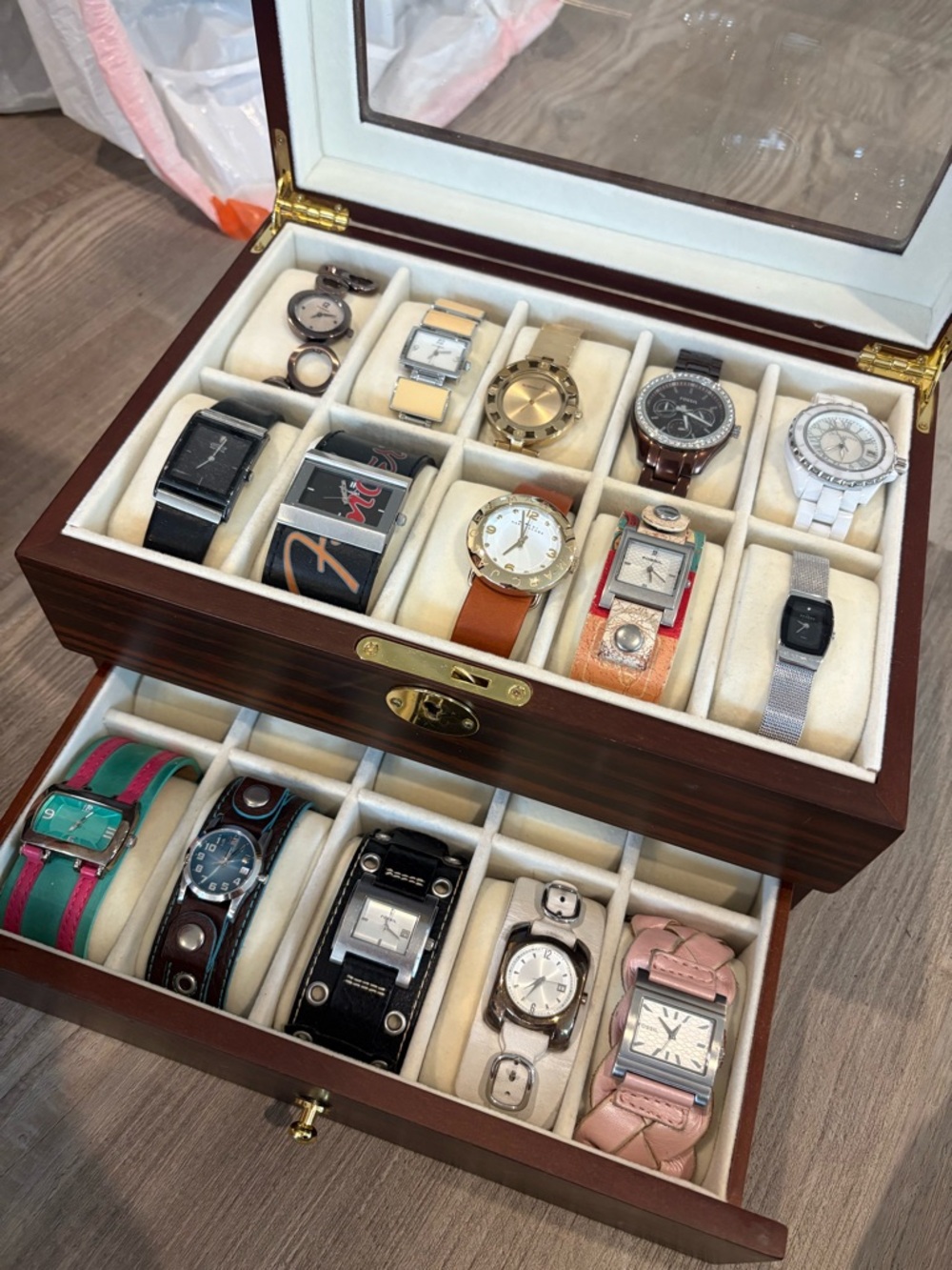 Collection of designer watches with brown box